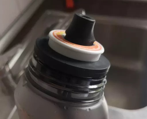 geurstof airpod op de drinkfles